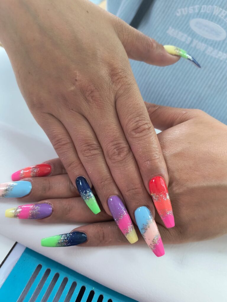 Colourful acrylic nails with a glossy finish, showcasing vibrant nail art created at Lorellin Hair & Beauty Salon in Bilston, Coseley, near Wolverhampton.