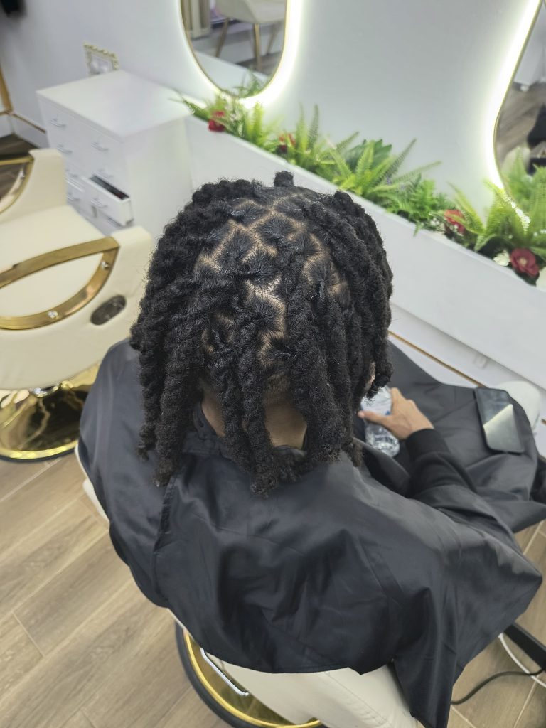 Neat locs hairstyle created at Lorellin Hair & Beauty Salon in Wolverhampton
