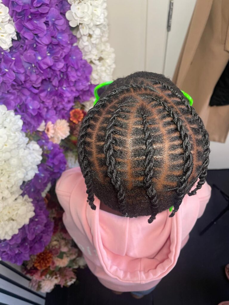 Kids neat cornrows with detailed parting by Lorellin Hair & Beauty in Wolverhampton