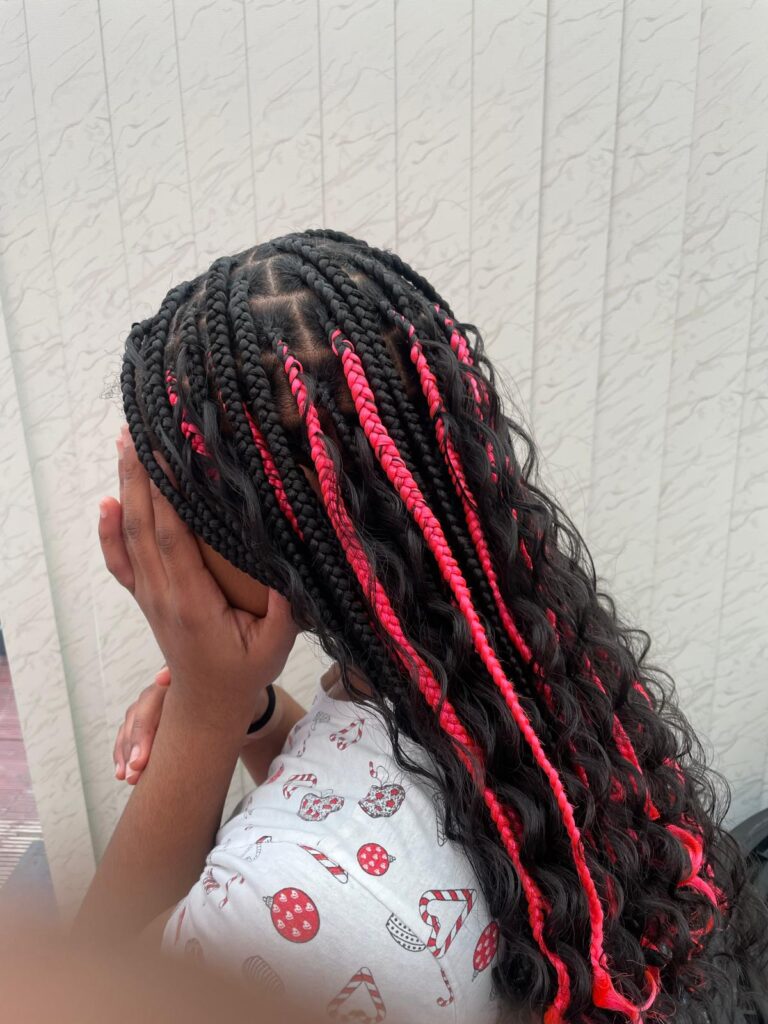 Kids boho braids with red highlights and curls by Lorellin Hair & Beauty in Wolverhampton