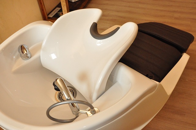 A professional salon hair wash basin at Lorellin Bilston Salon, designed for a comfortable and relaxing hair washing experience. Perfect for deep conditioning, scalp treatments, and luxury hair care services.