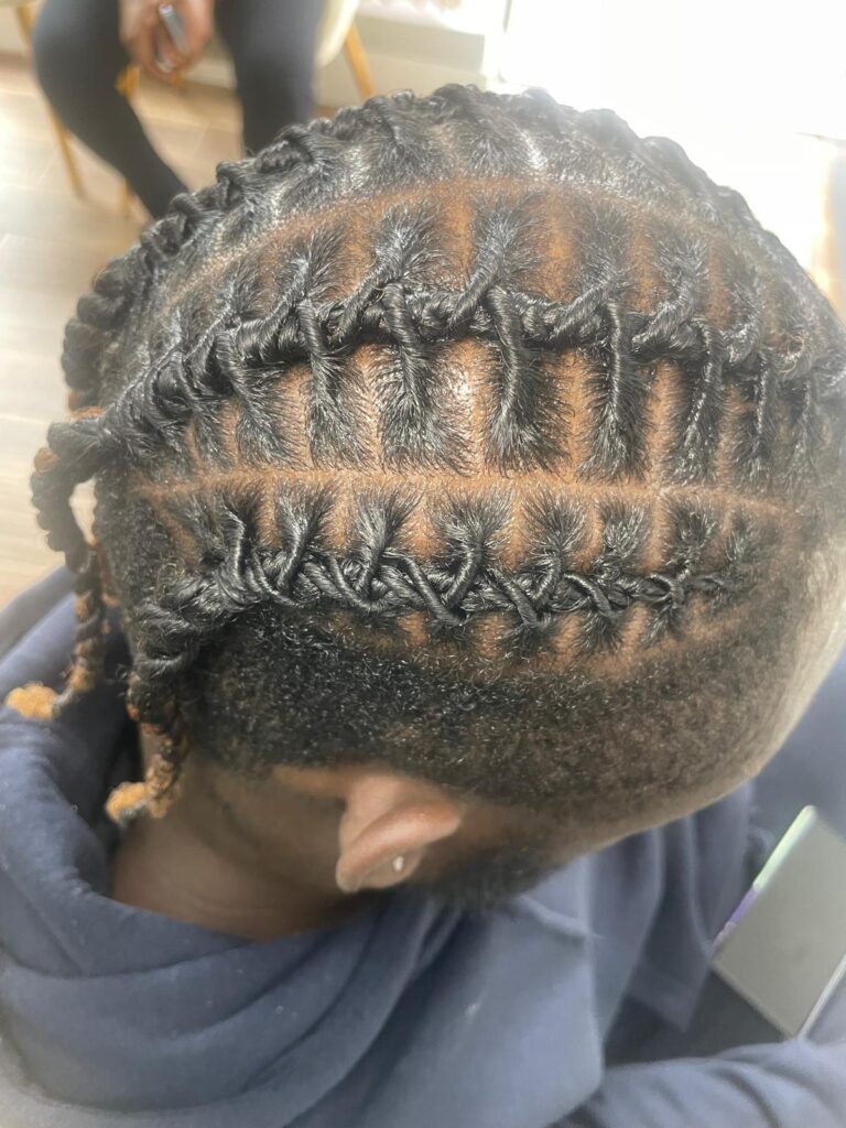 Creative stitch cornrows with horizontal band pattern by Lorellin Hair & Beauty in Wolverhampton