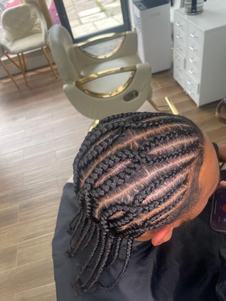 Mens feed in cornrows with neat parting by Lorellin Hair & Beauty in Wolverhampton