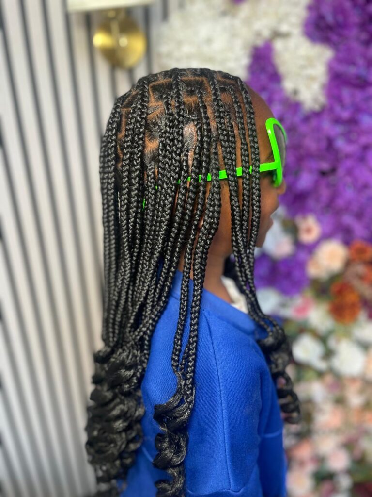 Kids braids with curled ends side view by Lorellin Hair & Beauty in Wolverhampton