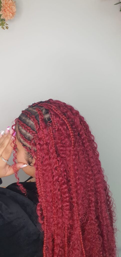 Red boho knotless braids with curls side view by Lorellin Hair & Beauty in Wolverhampton